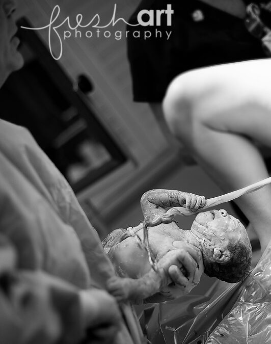 holding on. | St. Louis Birth Photographers