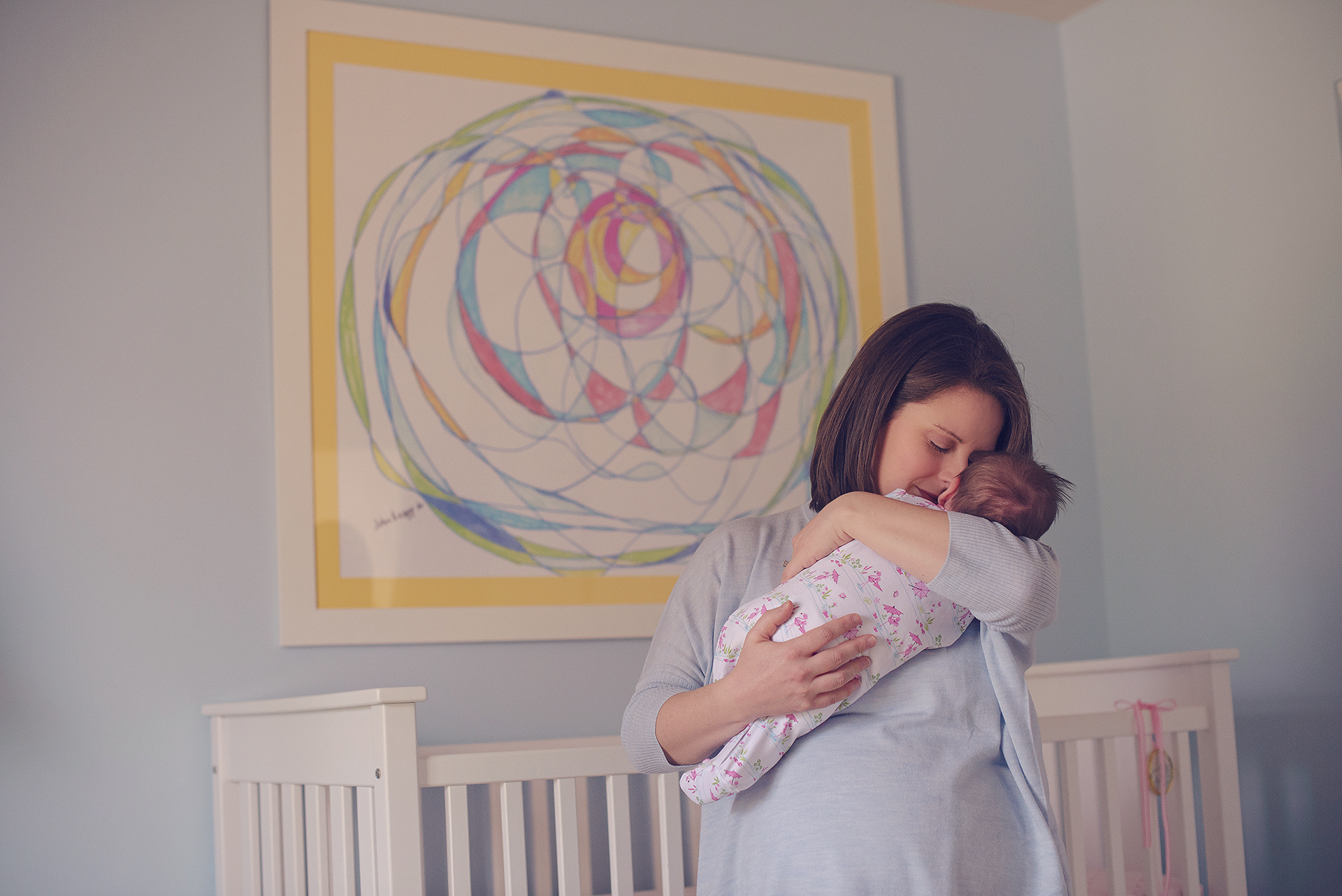 Mother snuggling with newborn - St. Louis Newborn Photographer - Fresh Art Photography - Jodie Allen