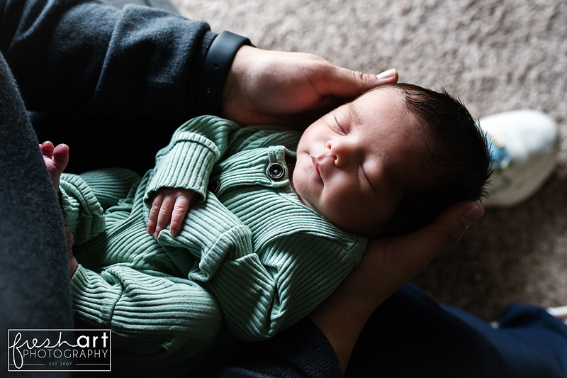 Mother snuggling with newborn - St. Louis Newborn Photographer - Fresh Art Photography - Jodie Allen